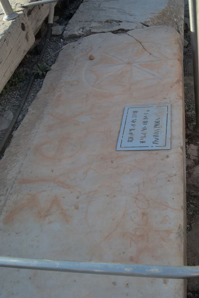 Some early Christian symbols on a piece of marble.