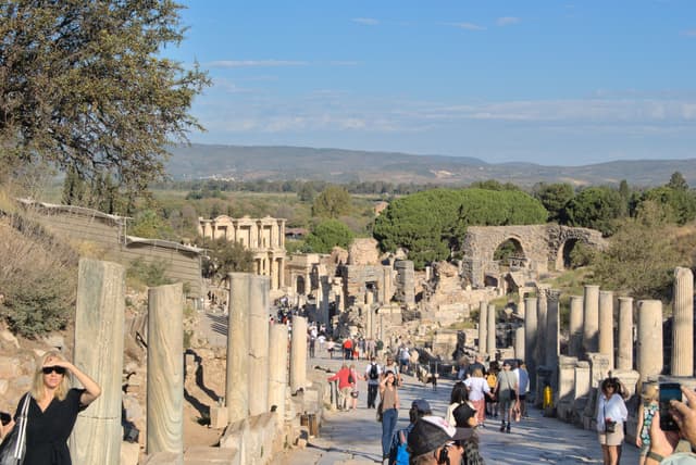 Continuing down the road.