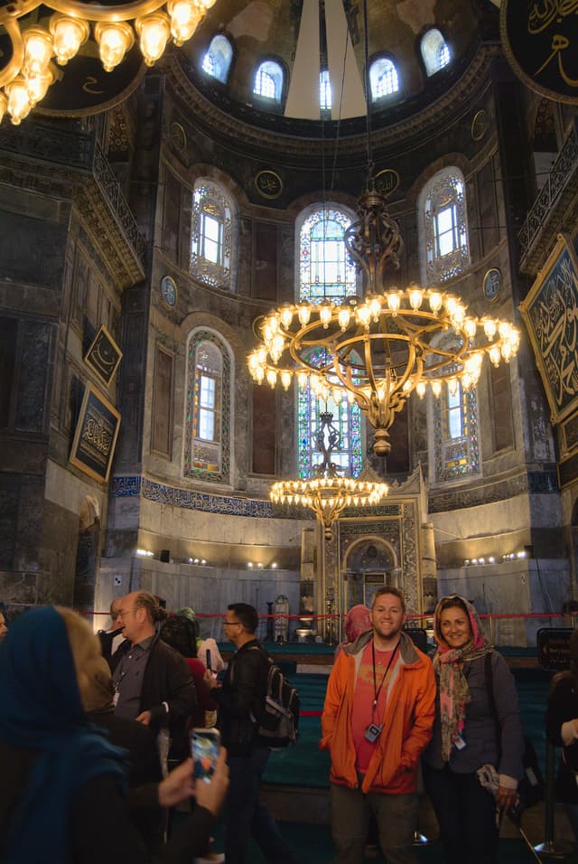 Me and out guide Shebby in the Hagia Sophia. Also, Karen taking her own picture of us in the corner.